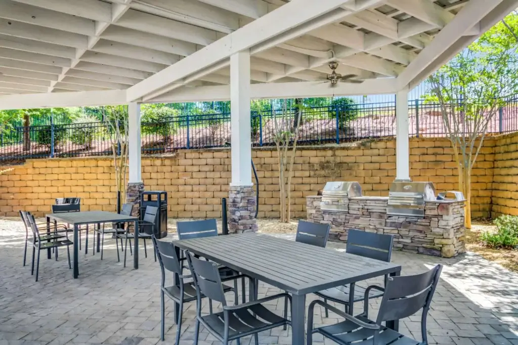 the collective at auburn luxury off campus cottage apartments near auburn university outdoor lounge area grills and picnic area 2