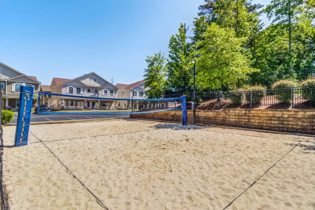 the collective at auburn luxury off campus cottage apartments near auburn university sand volleyball court 2