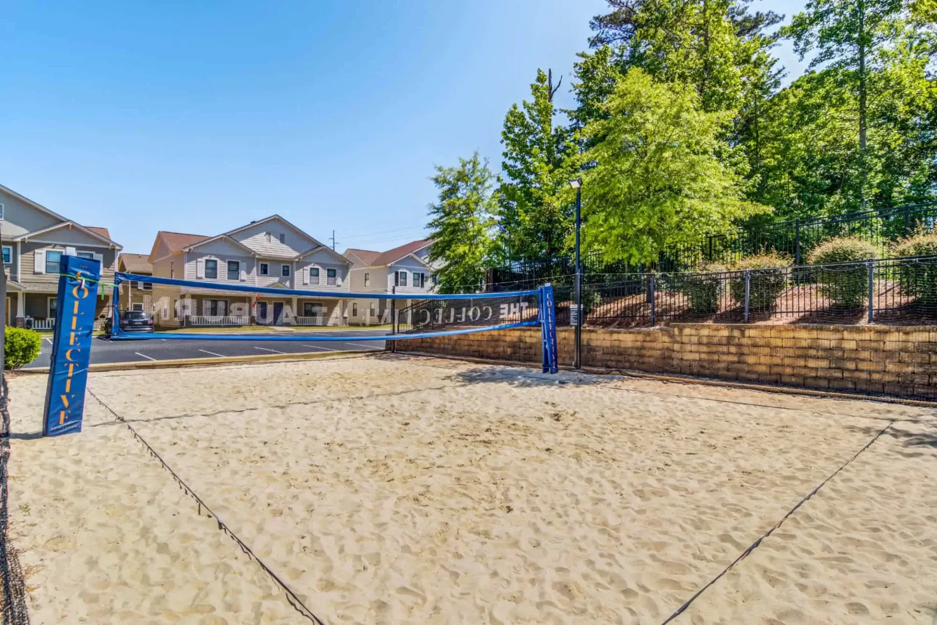 the collective at auburn luxury off campus cottage apartments near auburn university sand volleyball court 2